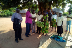 Bishop Johnson and Rev. Modicum with Bed KI Gen Housing  Group